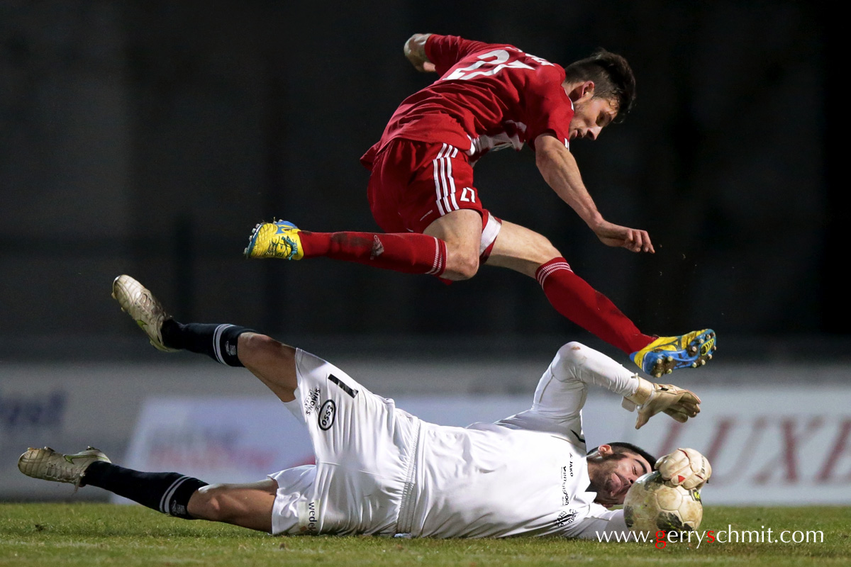 Arnaud SCHAAB saves the draw in overtime against Stefano BENSI during the game CS Grevenmacher - FOLA Esch