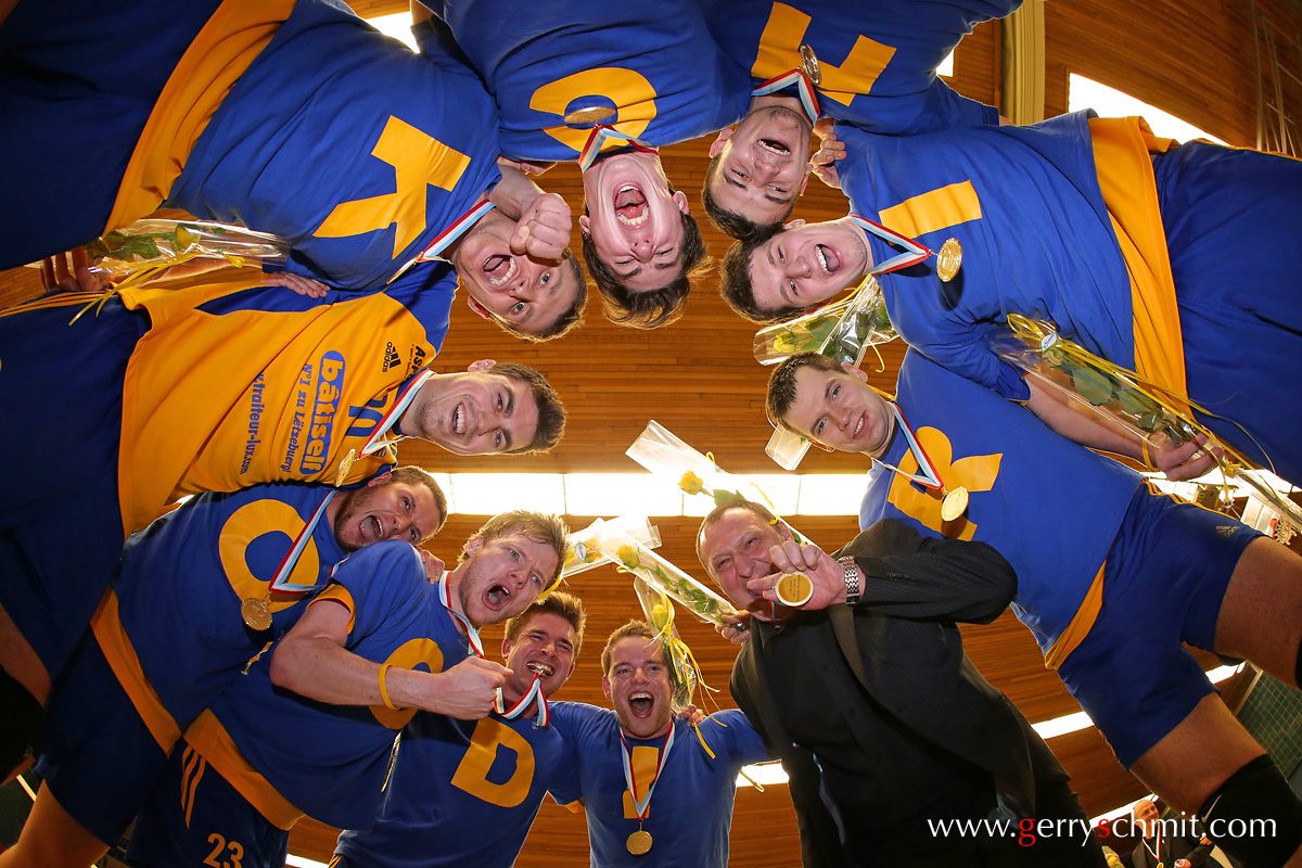 Players an Coaches of CHEV Diekirch celebrate their national title in Volleyball 2013