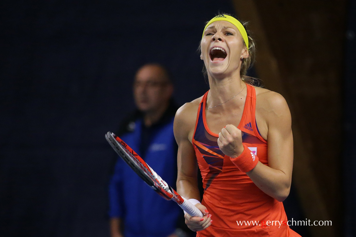 Katarzyna PITER of Poland reacts after her success against Yanina Wickmayer of Belgium