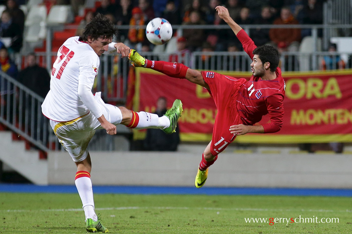 Joel PEDRO of Luxembourg tries to score with an trick shot against Montenegro