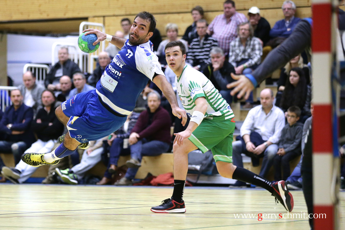 Dan Ley of HB dudelange goes for a jump shot against HC Berchem