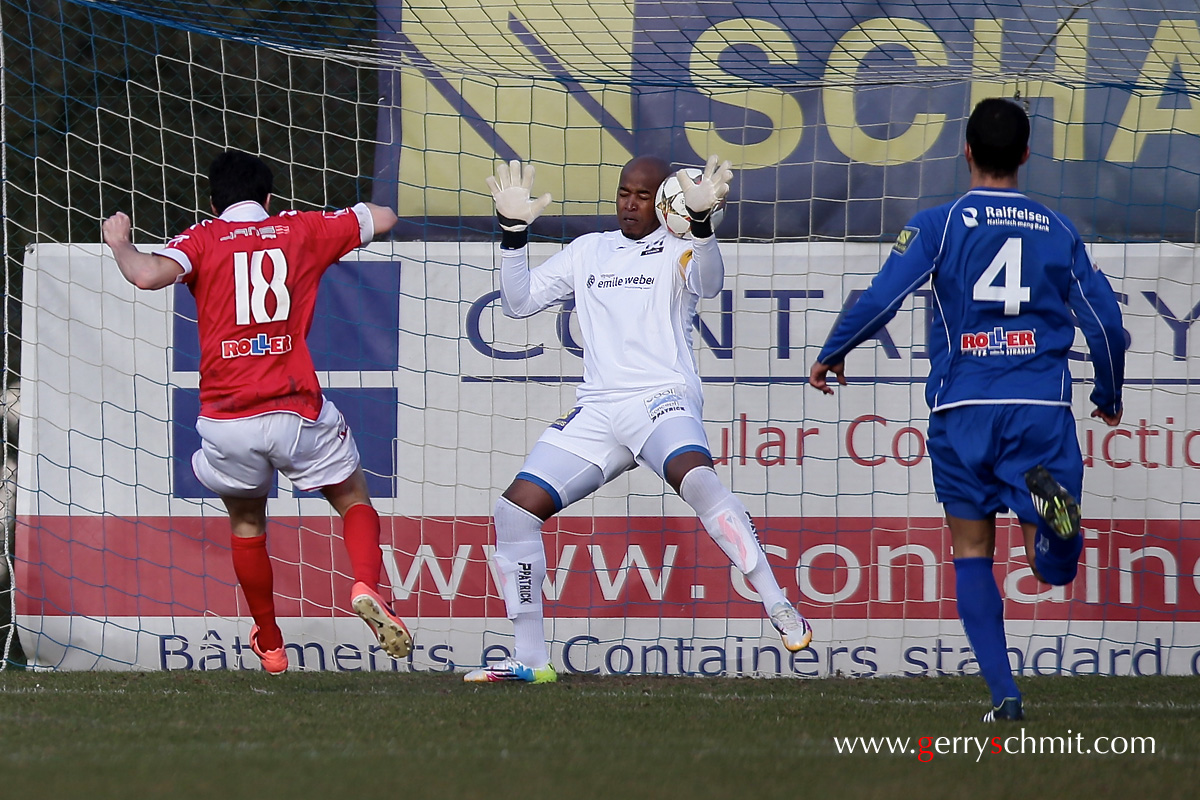 Goalkeaper Jailson Moreira saves a shot from Gary Forunier (FC Wiltz 71) with his shoulder