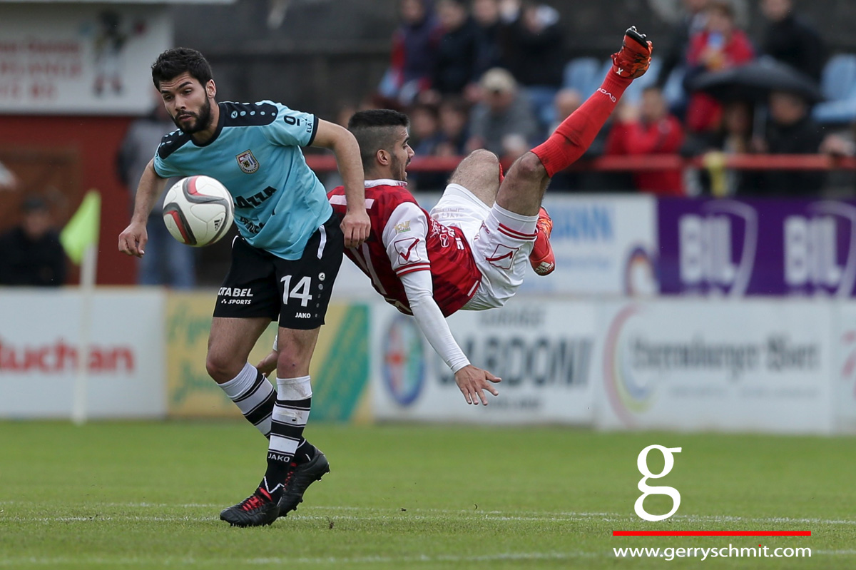 Joel Pedro (F91) challenges Antonio Oliveira Soares (FC Wiltz)